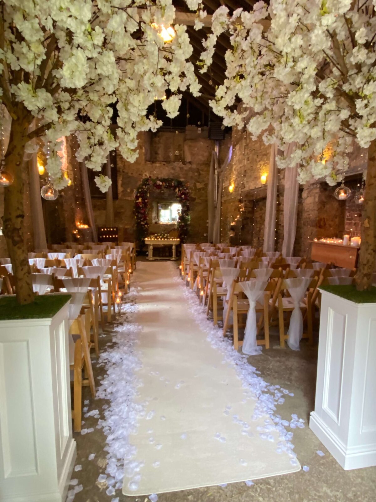 Wedding Blossom Trees 2 Wedding blossom trees with real wooden trunks and white aisle carpet runner